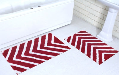 Set of two microfiber arrow-patterned bathmats from IR Home Furnishing, soft floor rugs for bathroom decor.