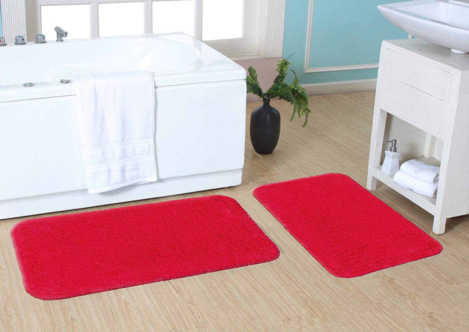 Two microfiber solid bathmats in a 2-piece set with rounded edges by IR Home Furnishing, ideal for bathroom decor.