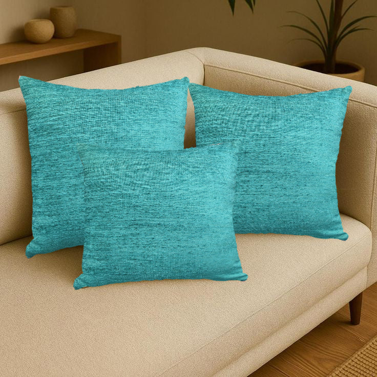 Set of three chenille woven cushions and a travel pillow from IR Home Furnishing, featuring soft, textured fabric in neutral tones.