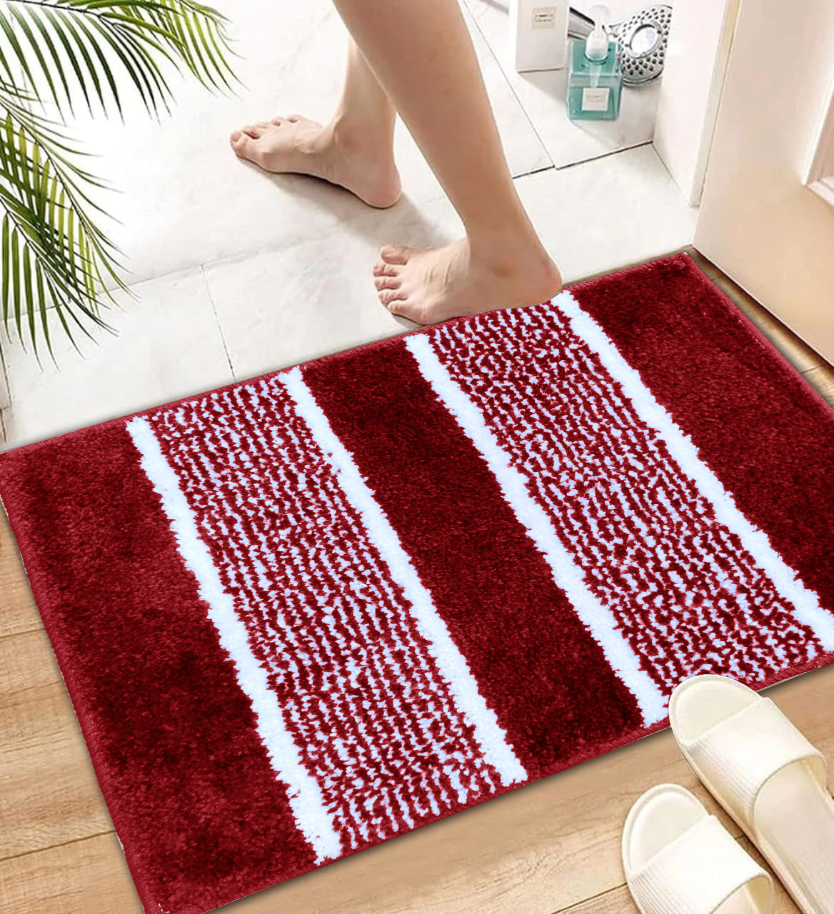 Super soft IR Home Furnishing bath mat with plush, absorbent fabric placed near a bathroom door, perfect for comfort and style.