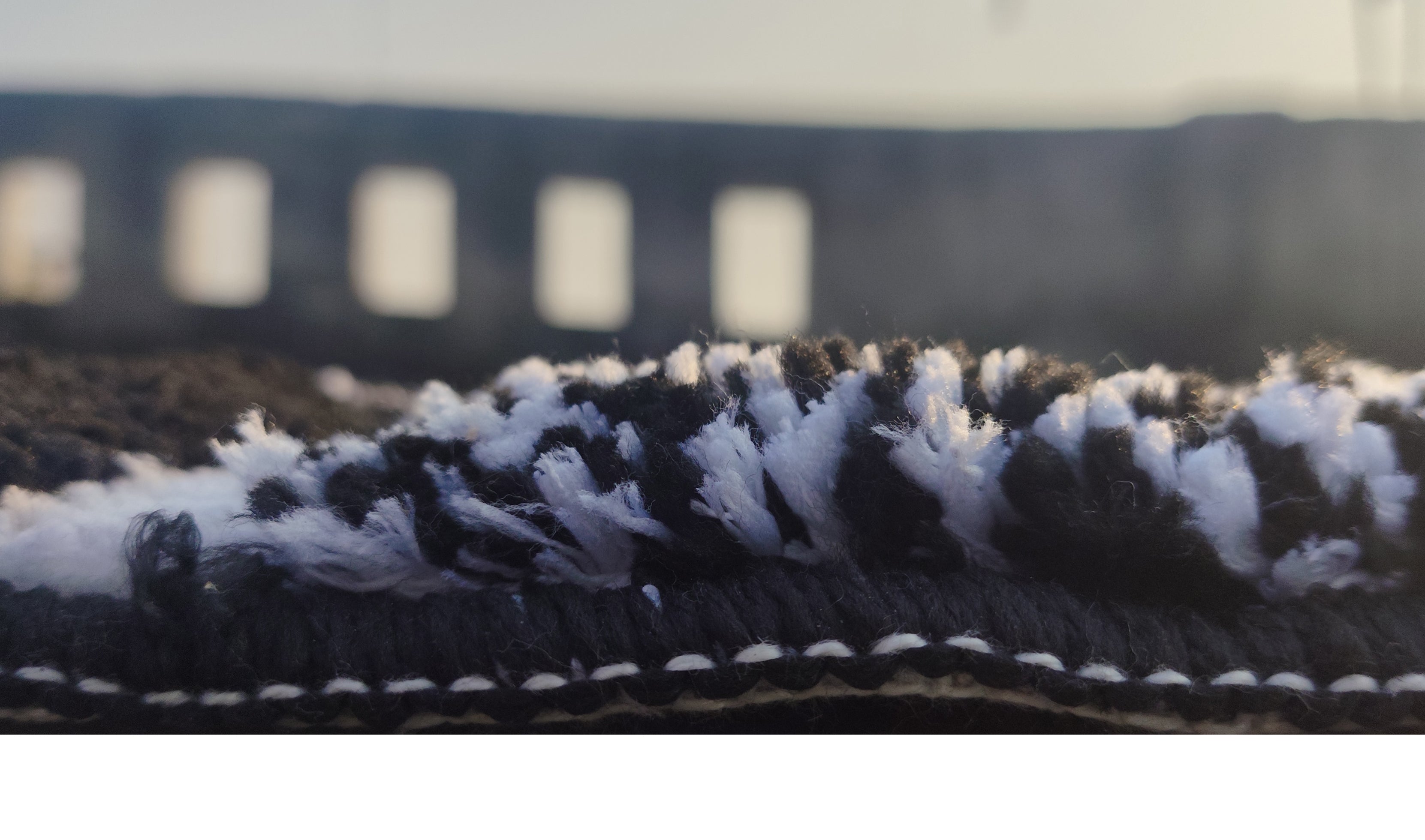 Microfiber tufted bathmat with box design from IR Home Furnishing, showcasing soft, plush texture and stylish area carpet pattern.